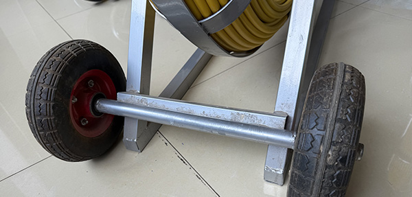 Solid steel bar with rubber wheels
